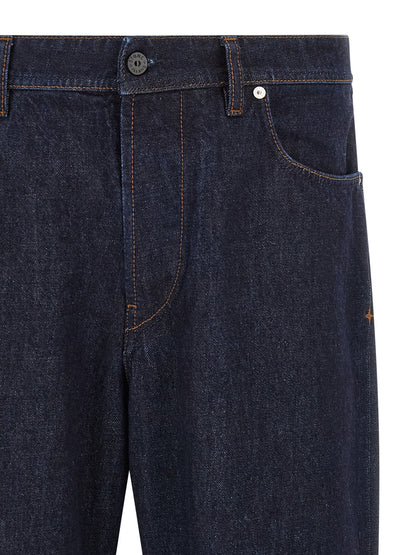 Jeans by Stone Island for men in organic cotton denim blue & indigo presents a tailored silhouette, showcasing a tailored straight-leg and long cut with a refined for a truly tailored aesthetic.