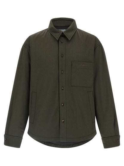 Windbreaker Jacket by Jacquemus for men in virgin wool bicolour, green & signature showcases a modern silhouette, integrating pockets, insulated & windproof and a modern for a sophisticated finish.