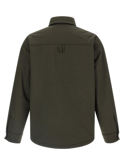Windbreaker Jacket by Jacquemus for men in virgin wool bicolour, green & signature presents a resilient silhouette, artfully detailed with a sophisticated and functional pockets, insulated & windproof for a resilient finish.