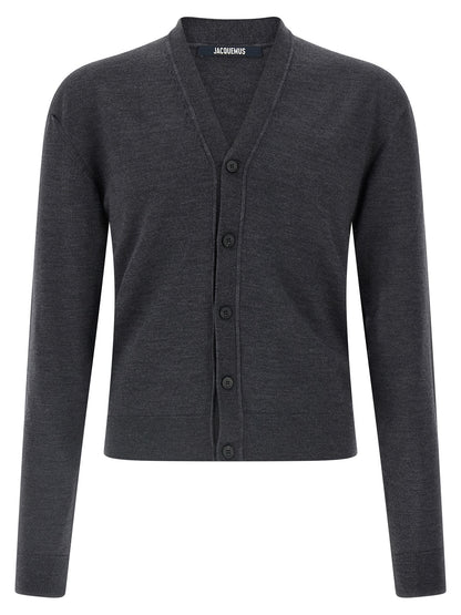 Cardigan by Jacquemus for men in merino wool gray features an crisp silhouette, showcasing a sophisticated wrap v-neck neckline and long-sleeve detail for a truly crisp finish.