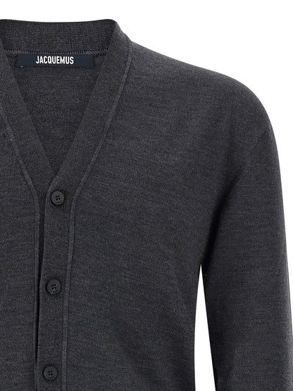 Cardigan by Jacquemus for men in merino wool gray showcases a captivating silhouette, artfully detailed with a captivating and wrap v-neck neckline for a truly sophisticated captivating look.