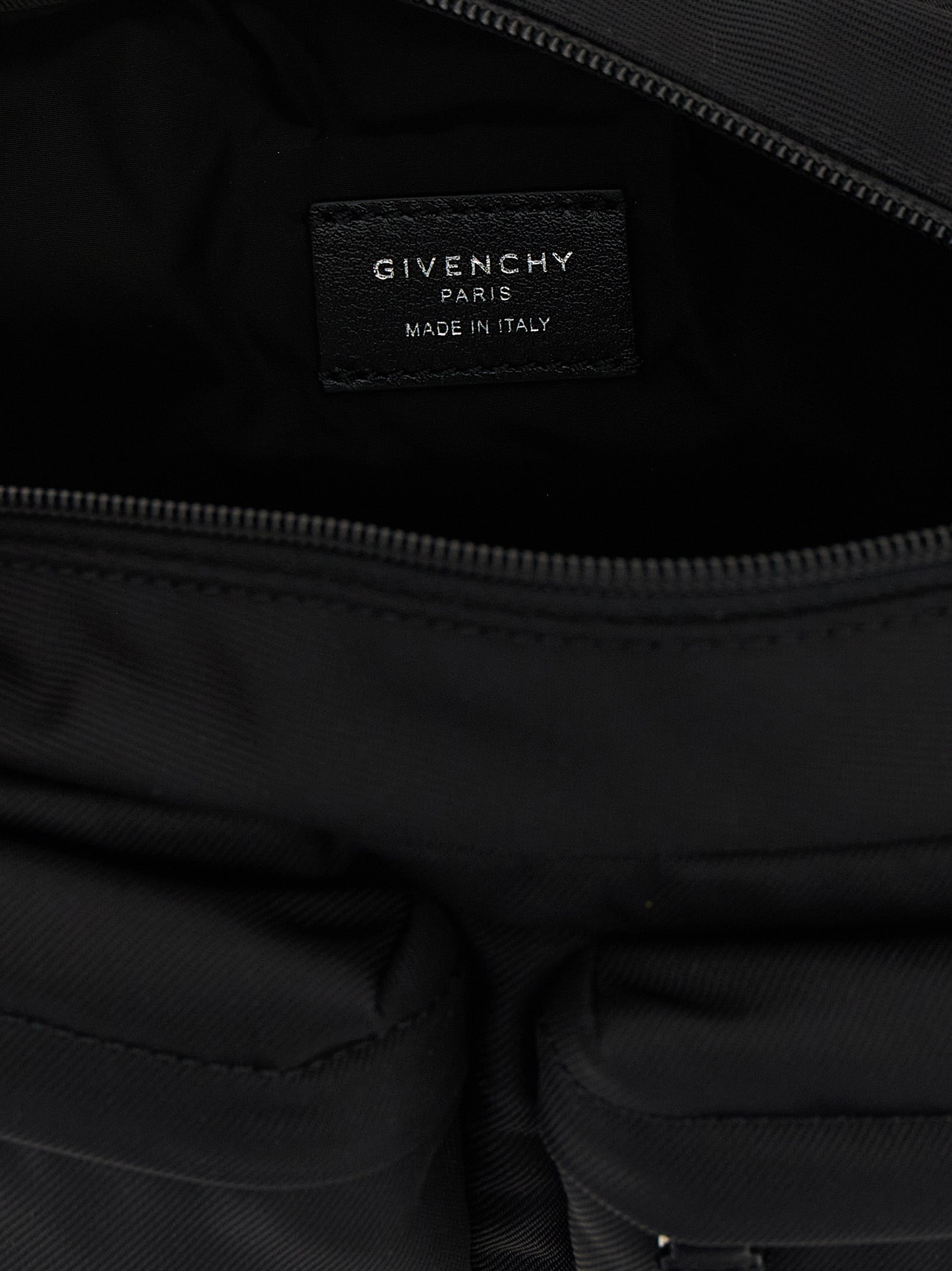 Crossbody Fanny Pack Messenger Bag by Givenchy for men in nylon black showcases a stylish Essential U Nylon Crossbody Fanny Pack Messenger Bag design, featuring a secure zipper and ample with versatile crossbody-strap, shoulder-strap & handle for a stylish look.