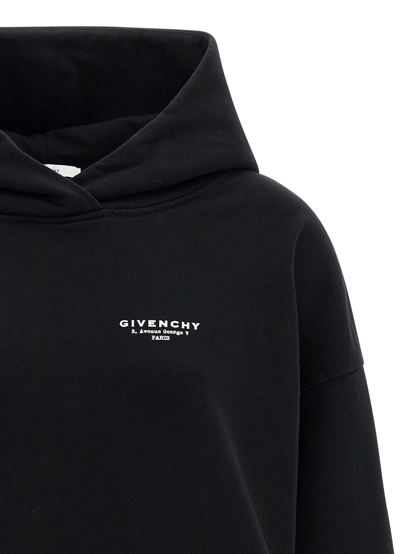 Sweatshirt Hoodie by Givenchy for women in cotton bicolour, black, white & print features a slouchy chic silhouette, detailed with a slouchy chic and a signature hooded neckline for an elevated aesthetic.