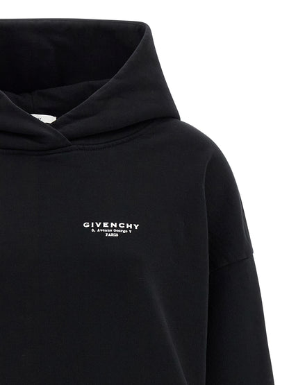 Sweatshirt Hoodie by Givenchy for women in cotton bicolour, black, white & print features a slouchy chic silhouette, detailed with a slouchy chic and a signature hooded neckline for an elevated aesthetic.