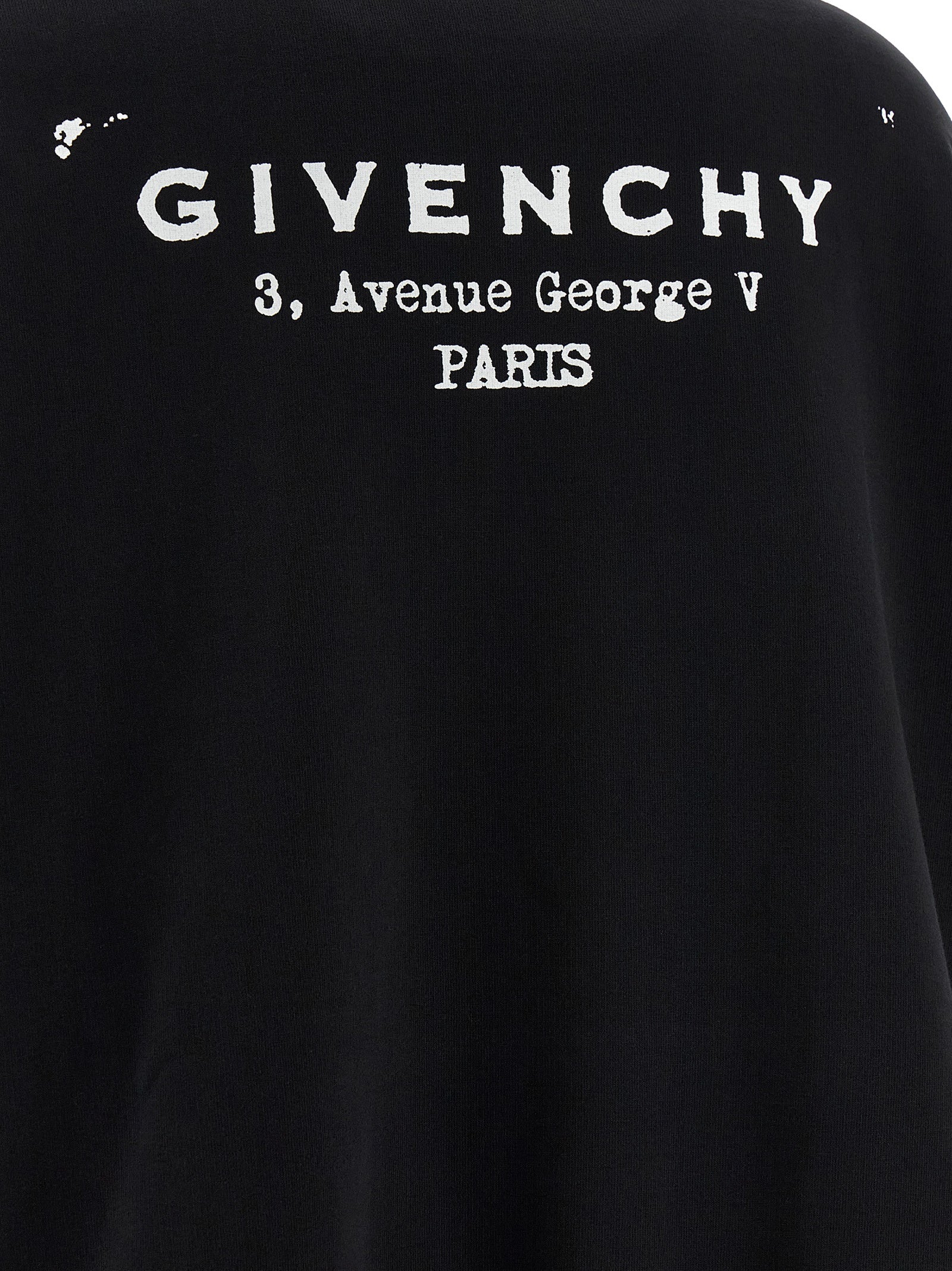 Sweatshirt Hoodie by Givenchy for women in cotton bicolour, black, white & print features an dramatic silhouette, showcasing a sophisticated and dramatic for a refined, modern aesthetic.