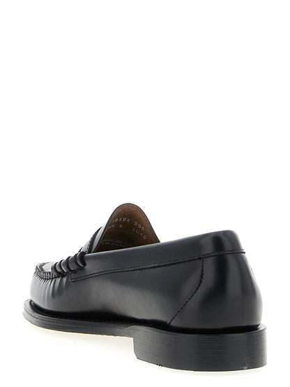 This Loafer Slip-On Shoes by G.H. BASS for men in cowhide leather black features an exquisite silhouette from the Icon Men's Cowhide Leather Loafer Slip-On Shoes collection, defined by a sophisticated and elegant .