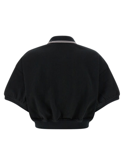 Polo Shirt by T BY ALEXANDER WANG for women in cotton black presents a distinguished silhouette, showcasing a sophisticated and distinguished for a truly distinguished finish.