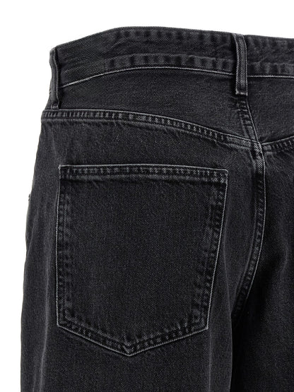 Jeans by Agolde for women in denim cotton black presents a refined pantology silhouette, artfully defined by a refined pantology relaxed-fit & wide, long, and a sophisticated .