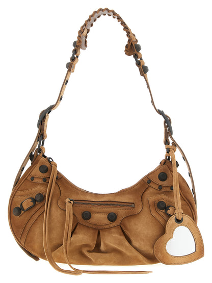 Shoulder Crescent Bag by Balenciaga for women in zamak brass canvas & suede calf leather brown features a effortless sophistication silhouette, secured by a zipper with ample and versatile shoulder-strap, adjustable-strap & handle for a effortless sophistication finish.