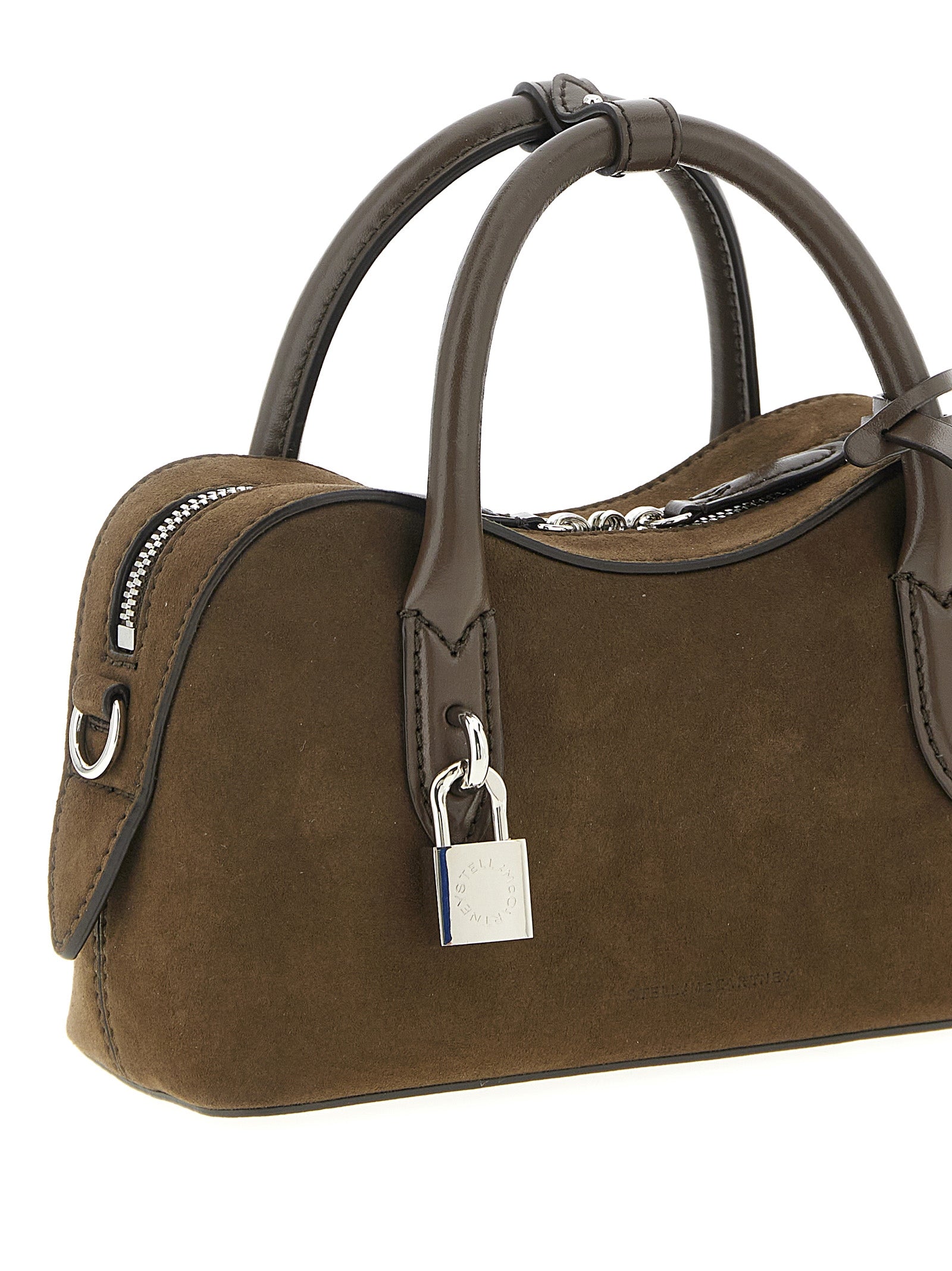 This Handbag by Stella McCartney for women in polyester and brown presents a sculptural silhouette featuring a secure zipper, ample , and versatile shoulder-strap, adjustable-strap & handle for a sculptural finish.