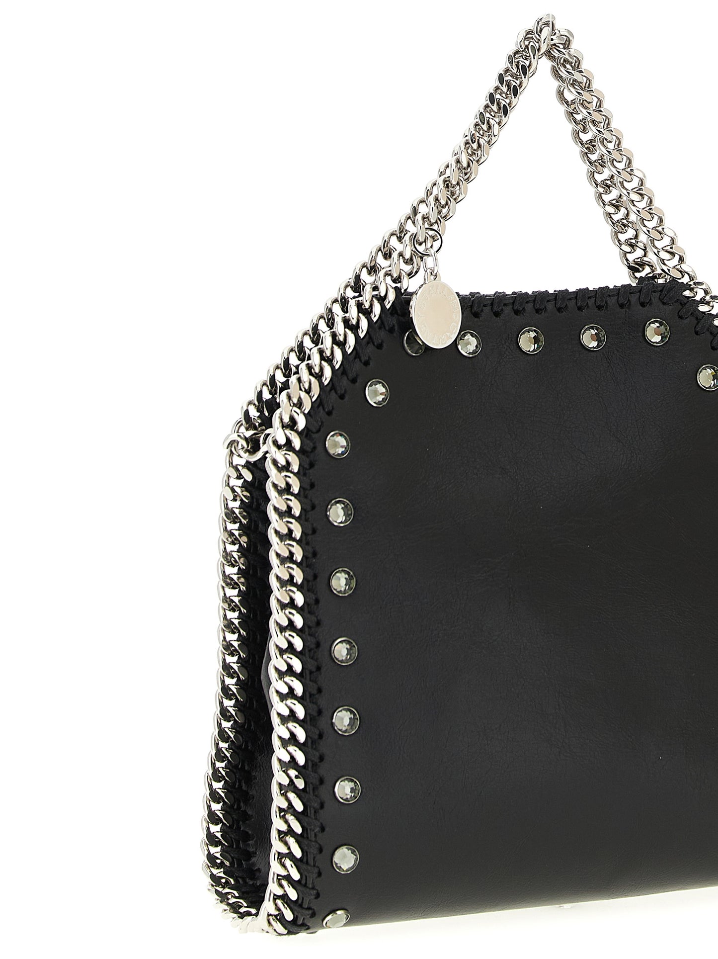 Handbag by Stella McCartney for women in exotic leather & crystal black features a ornamental silhouette, showcasing a secure magnetic, ample , and ornamental shoulder-strap & handle for a sophisticated look.