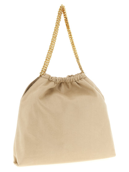 Shoulder Drawstring Bag by Stella McCartney for women in polyester beige, gold & signature features a effortless sophistication silhouette, secured by a drawstring & magnetic with ample and versatile shoulder-strap & handle for a effortless sophistication finish.