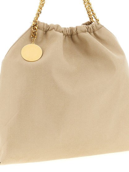 Shoulder Drawstring Bag by Stella McCartney for women in polyester beige, gold & signature features a statuesque silhouette, showcasing a secure drawstring & magnetic and statuesque with versatile shoulder-strap & handle for a statuesque finish.