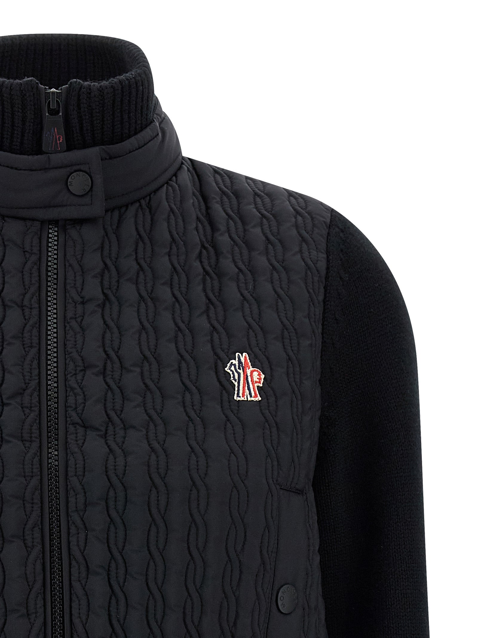 Cardigan by Moncler Grenoble for women in polyamide wool black features a dramatic silhouette, showcasing a sophisticated high-neck neckline and dramatic detail for a timeless, premium look.