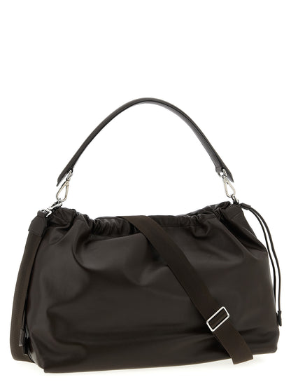 Messenger Handbag by Fendi for unisex in calfskin leather brown features a contemporary silhouette, showcasing a secure flap & drawstring, ample , and contemporary shoulder-strap, adjustable-strap, detachable-strap & handle for a sophisticated look.