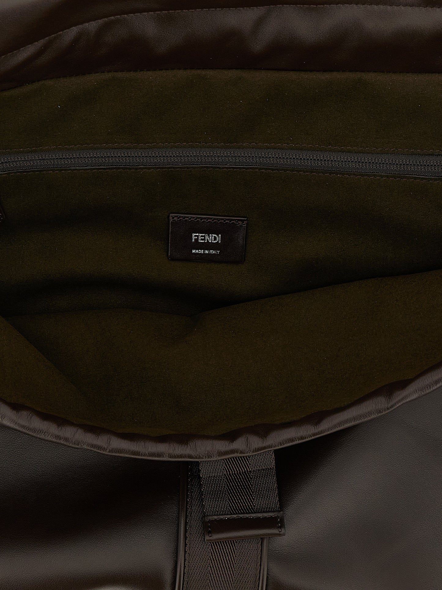 This Messenger Handbag by Fendi for unisex in calfskin leather and brown presents a sculptural silhouette featuring a secure flap & drawstring, ample , and versatile shoulder-strap, adjustable-strap, detachable-strap & handle for a sculptural finish.