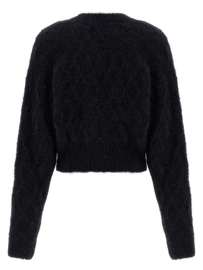 Cardigan by ROTATE BIRGER CHRISTENSEN for women in polyamide leather & alpaca wool black & patterned presents a textural silhouette, artfully finished with a textural v-neck neckline and for a sophisticated, textural look.