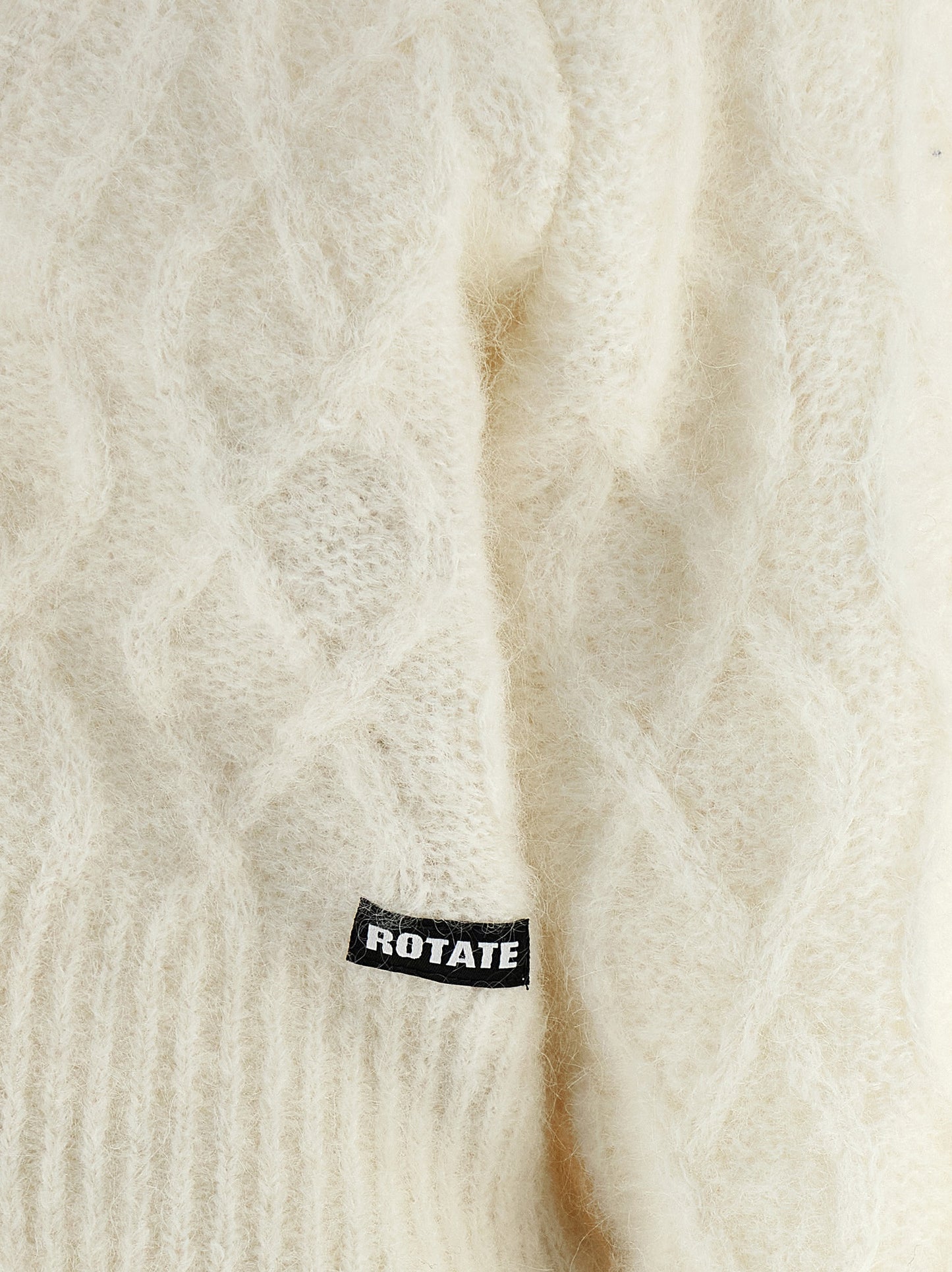 Cardigan by ROTATE BIRGER CHRISTENSEN for women in polyamide mohair & alpaca wool white & patterned presents a textural silhouette, artfully finished with a textural and for a sophisticated, textural look.