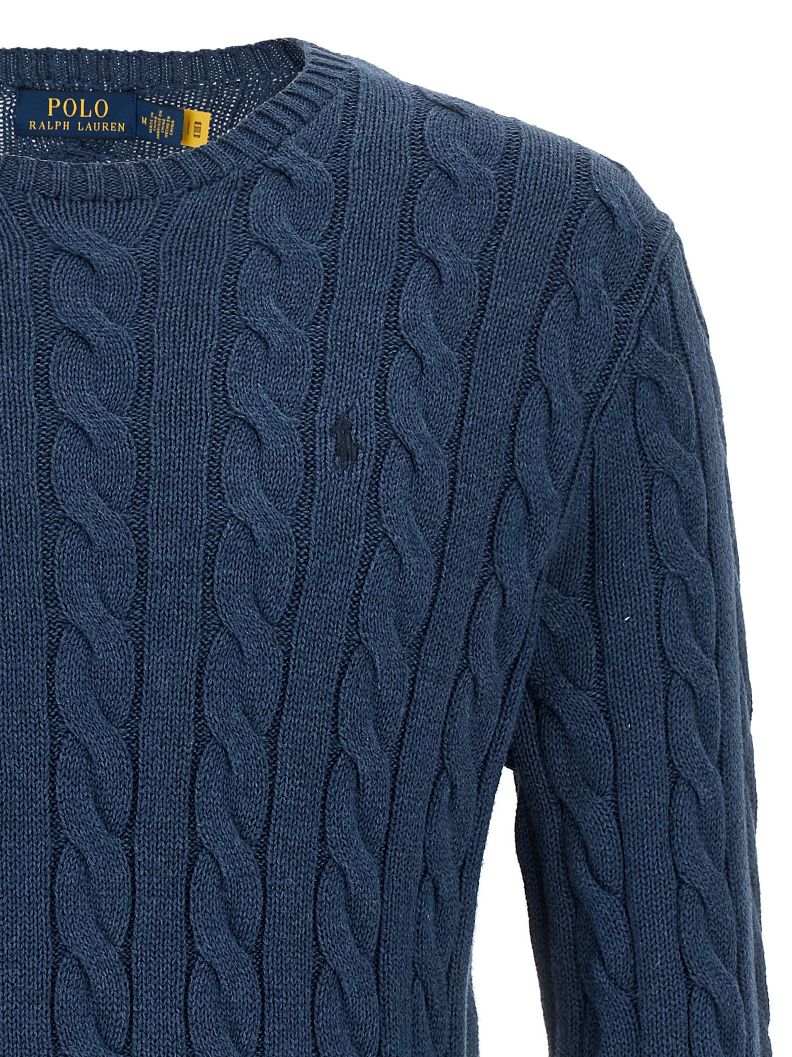 Cardigan by Polo Ralph Lauren for men in cotton blue showcases a luxurious silhouette, meticulously detailed with a sophisticated crew neckline and for a refined finish.