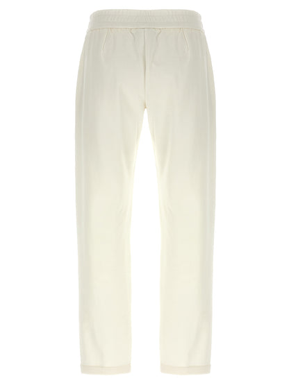 Joggers by Brunello Cucinelli for women in stretch cotton white & signature features an sophisticated and relaxed-fit with a precise long, creating a sophisticated and sophisticated silhouette.