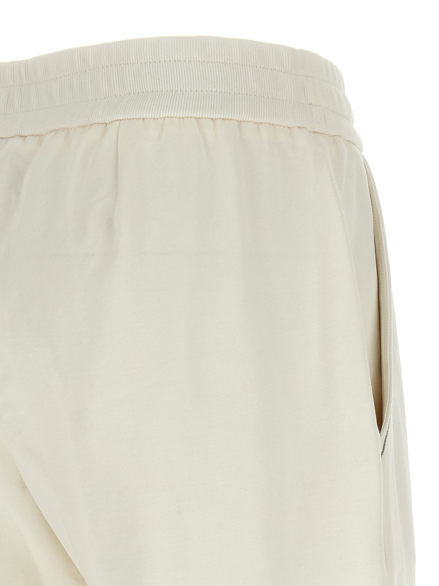 Joggers by Brunello Cucinelli for women in stretch cotton white & signature features a refined silhouette with a refined relaxed-fit, defined by a and a refined long for a refined finish.