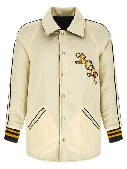 This Jacket by BODE for men in satin wool multicolor & monogram showcases a magnificent silhouette, meticulously crafted with a distinctive shirt-collar neckline and functional pockets for a magnificent finish.