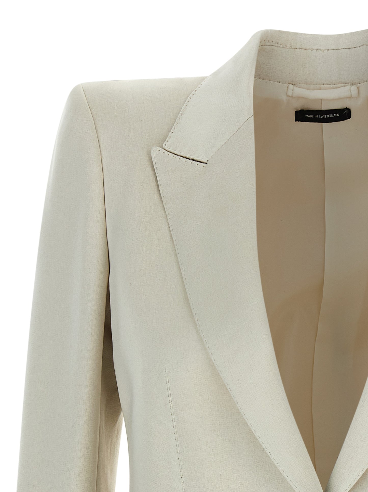 Blazer by Tom Ford for women in silk cotton & cupro beige features an crisp silhouette with sophisticated and a crisp split neckline for a truly crisp finish.