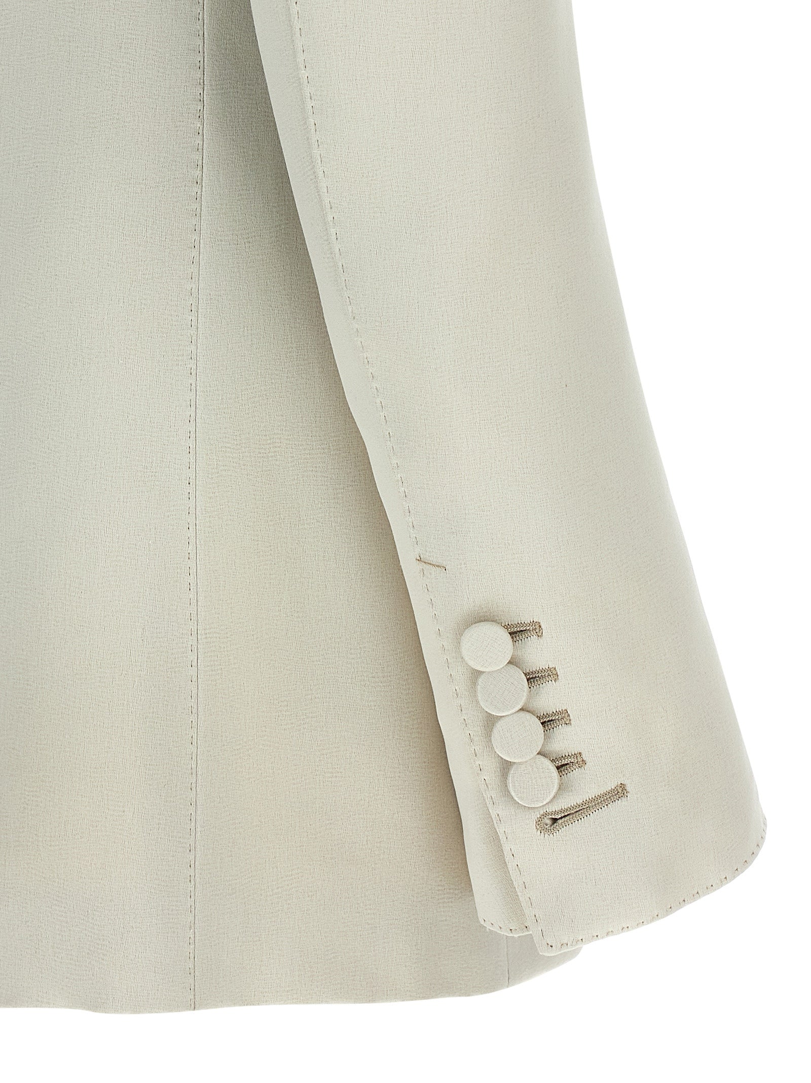 This Blazer by Tom Ford for women in silk cotton & cupro beige presents a tailored silhouette, meticulously tailored with a tailored and distinctive for a tailored finish.