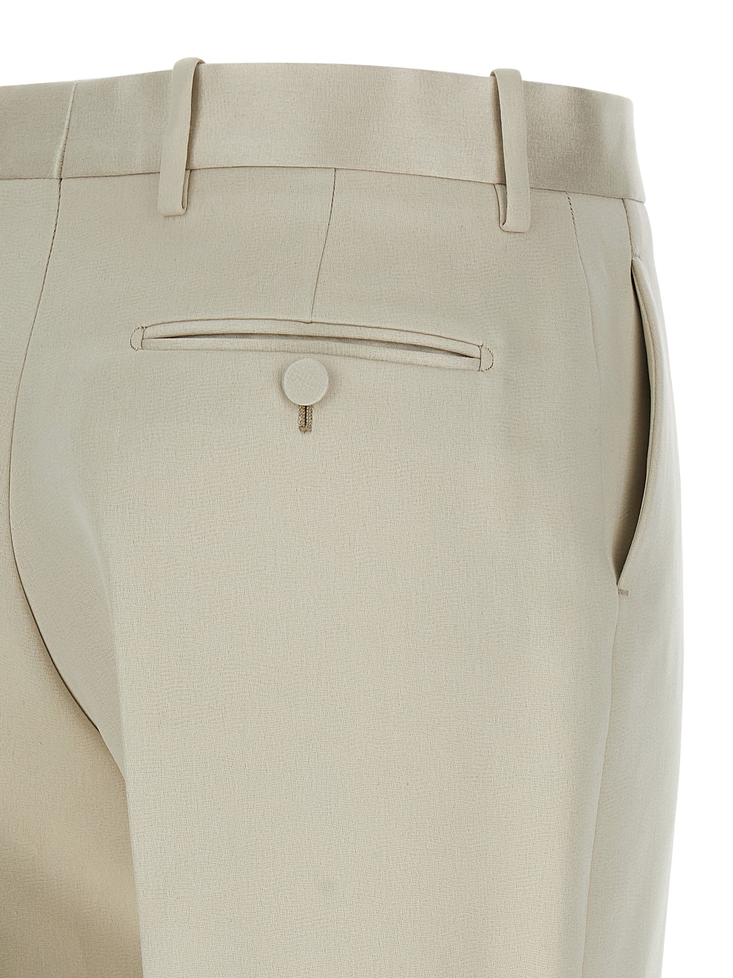 Trousers by Tom Ford for women in cotton & silk beige features a tailored silhouette with a tailored straight-leg, defined by its long and a sophisticated .