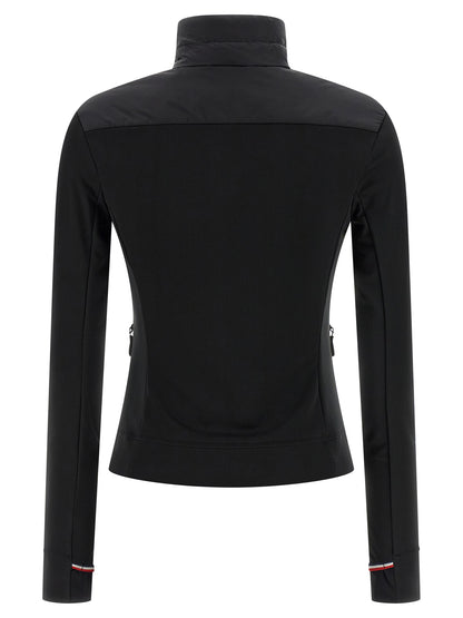 Cardigan by Moncler Grenoble for women in nylon & silicone black presents a textural silhouette, artfully finished with a textural high-neck neckline and for a sophisticated, textural look.