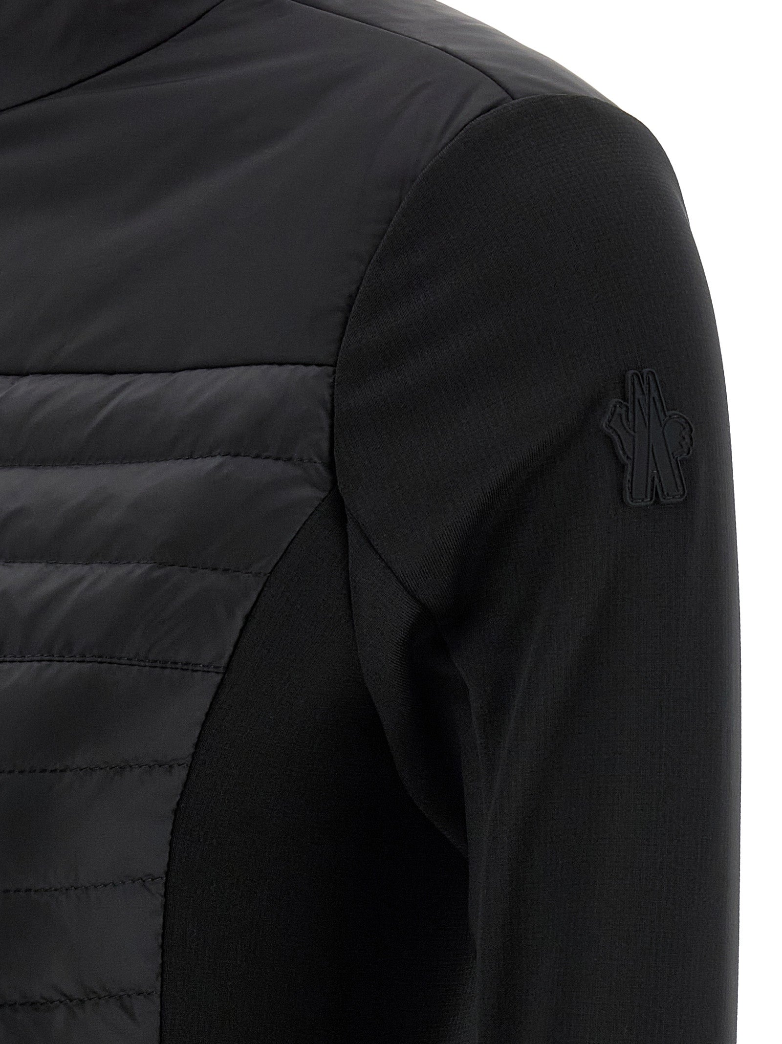 Cardigan by Moncler Grenoble for women in nylon & silicone black presents a textural silhouette, artfully finished with a textural and for a sophisticated, textural look.