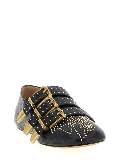 Ballet Flat Shoes by Chloé for women in lamb leather black & gold showcases a dynamic silhouette, artfully capturing Women's Lamb Leather Ballet Flat Shoes through its distinctive and elegant .