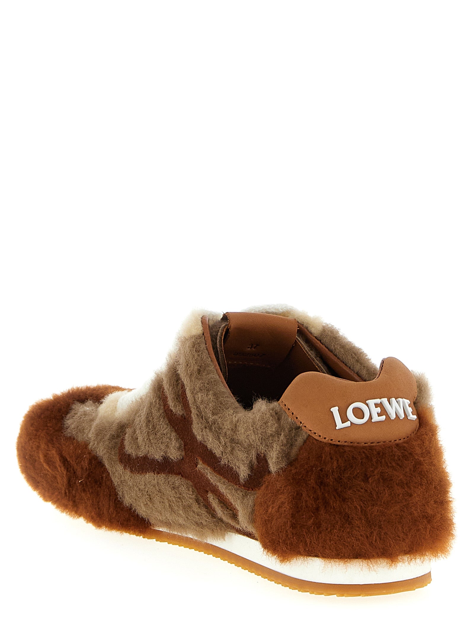 Sneakers by Loewe for women in plush polyester velvet & lamb leather brown presents a impeccable silhouette as Women's Low Top Sock Plush Polyester Velvet & Lamb Leather Sneakers, expertly defined by a impeccable low-top sock style for a impeccable, high-fashion look.