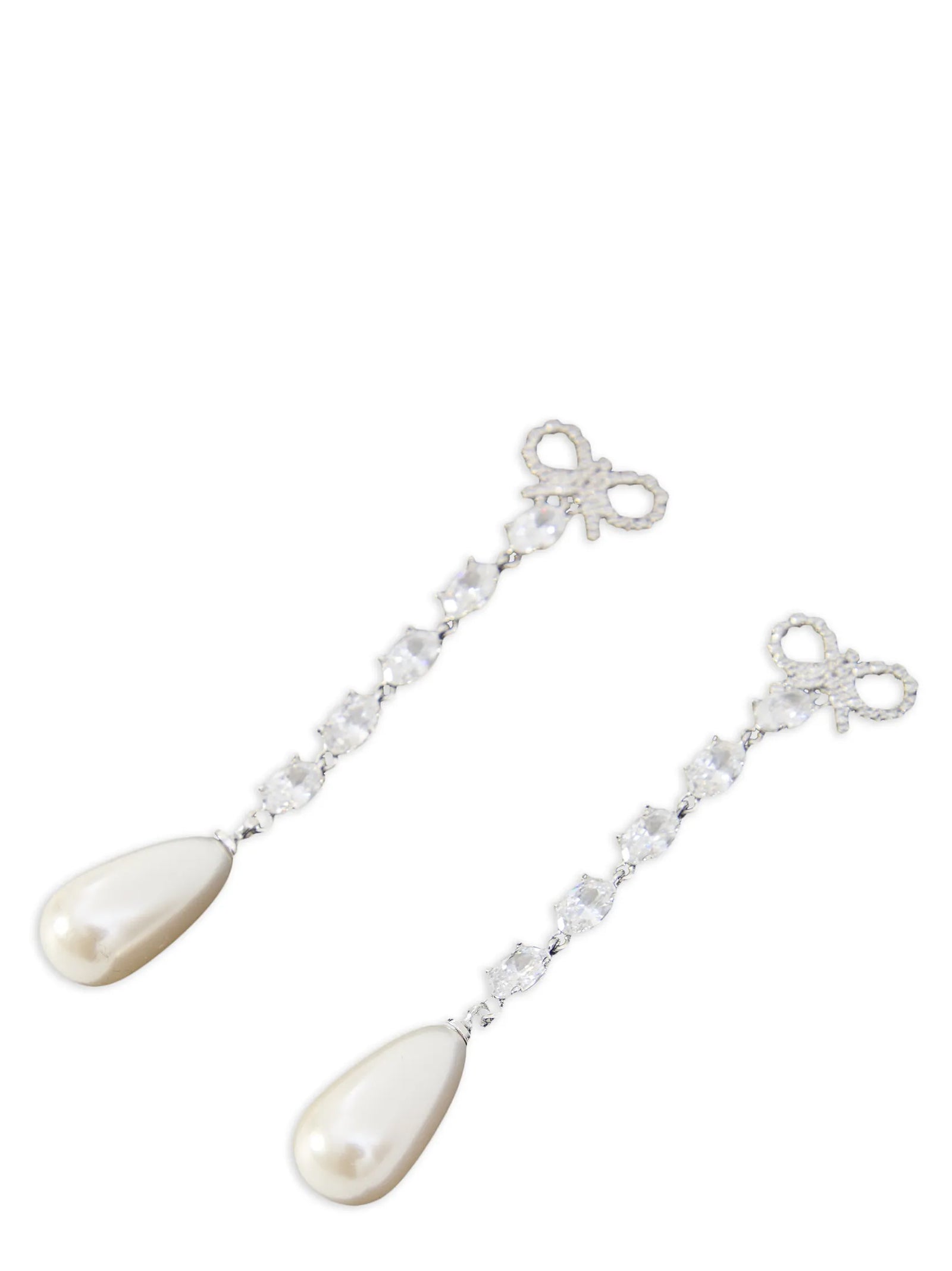 Earrings by Self-Portrait for women in cotton denim copper, pearl & silver presents a curated silhouette, artfully showcasing the curated and refined aesthetic of the Women's Silver Copper & Pearls Earrings.