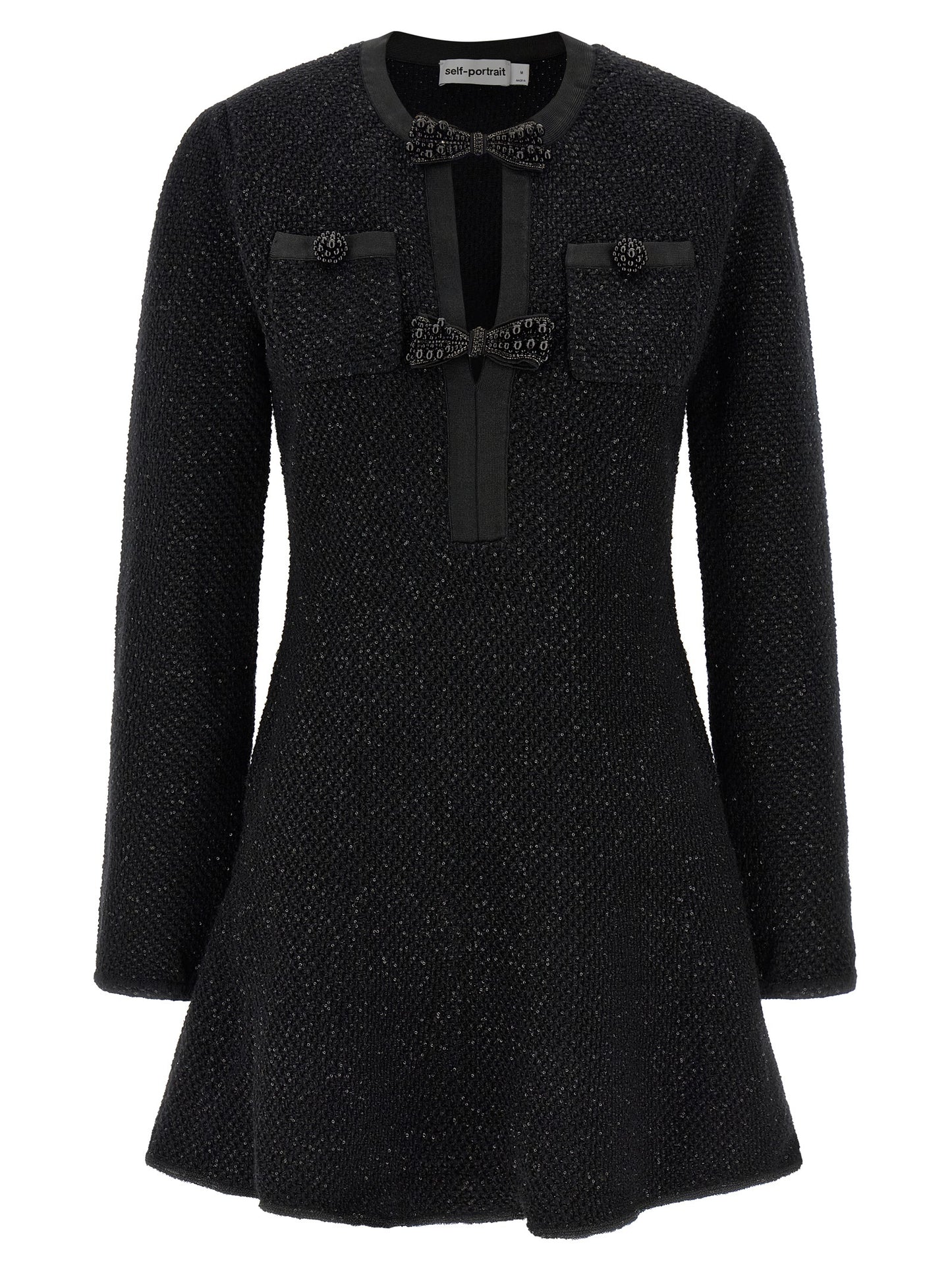 Dress by Self-Portrait for women in cotton polyester wool & sequins black showcases a striking silhouette, elegantly detailed with a , refined crew neckline, and a striking short mini for a striking finish.