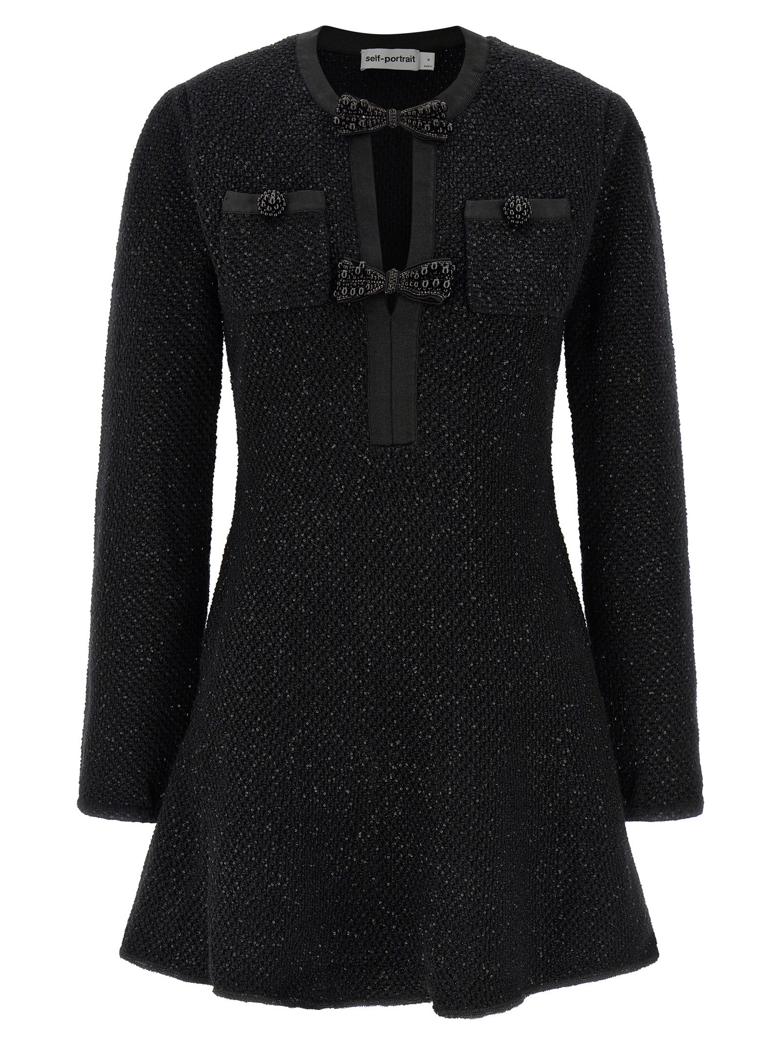 Dress by Self-Portrait for women in cotton polyester wool & sequins black showcases a striking silhouette, elegantly detailed with a , refined crew neckline, and a striking short mini for a striking finish.