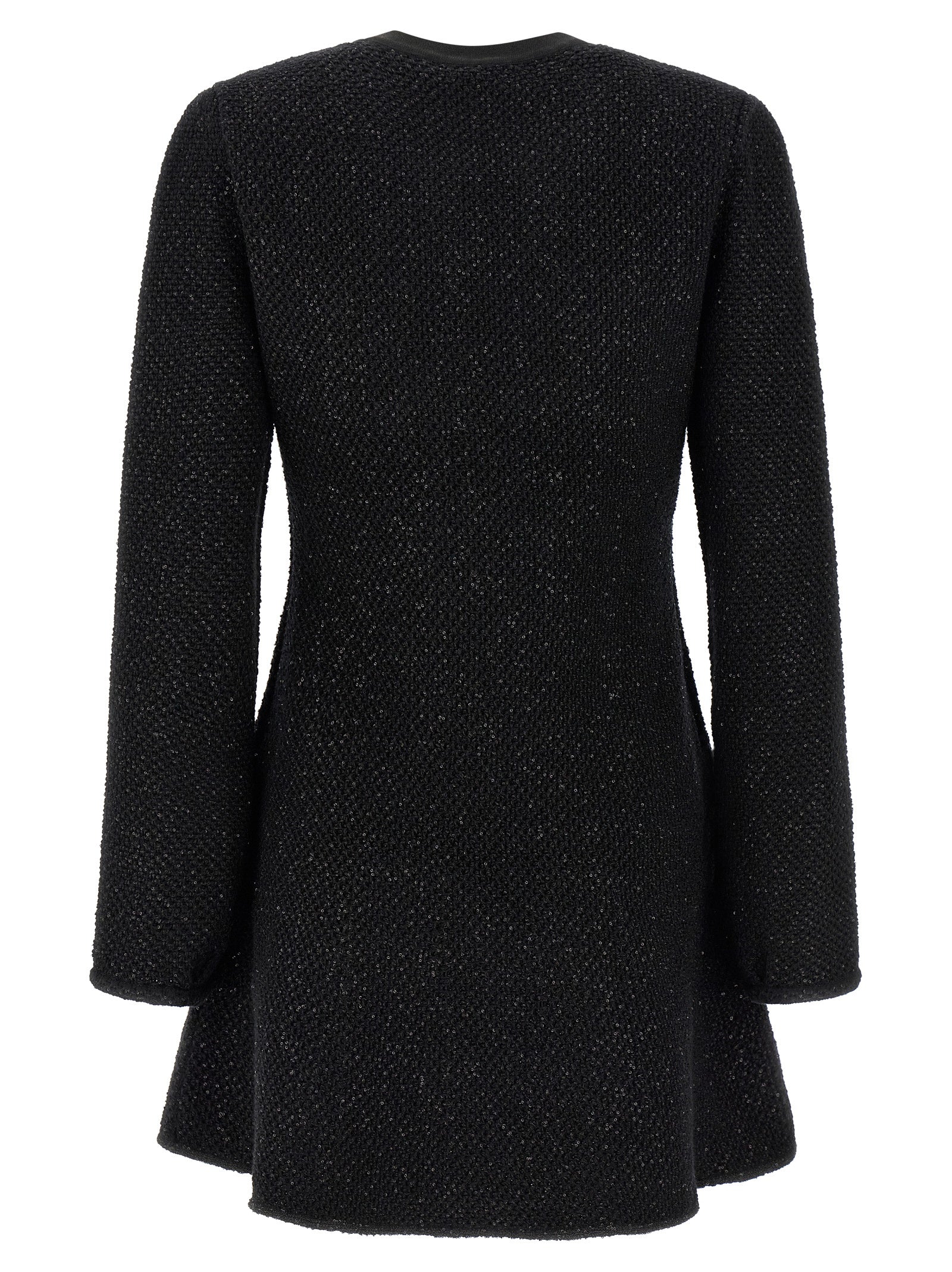 Dress by Self-Portrait for women in cotton polyester wool & sequins black features a dramatic silhouette, showcasing an elegant crew neckline and that flows into a dramatic short mini.