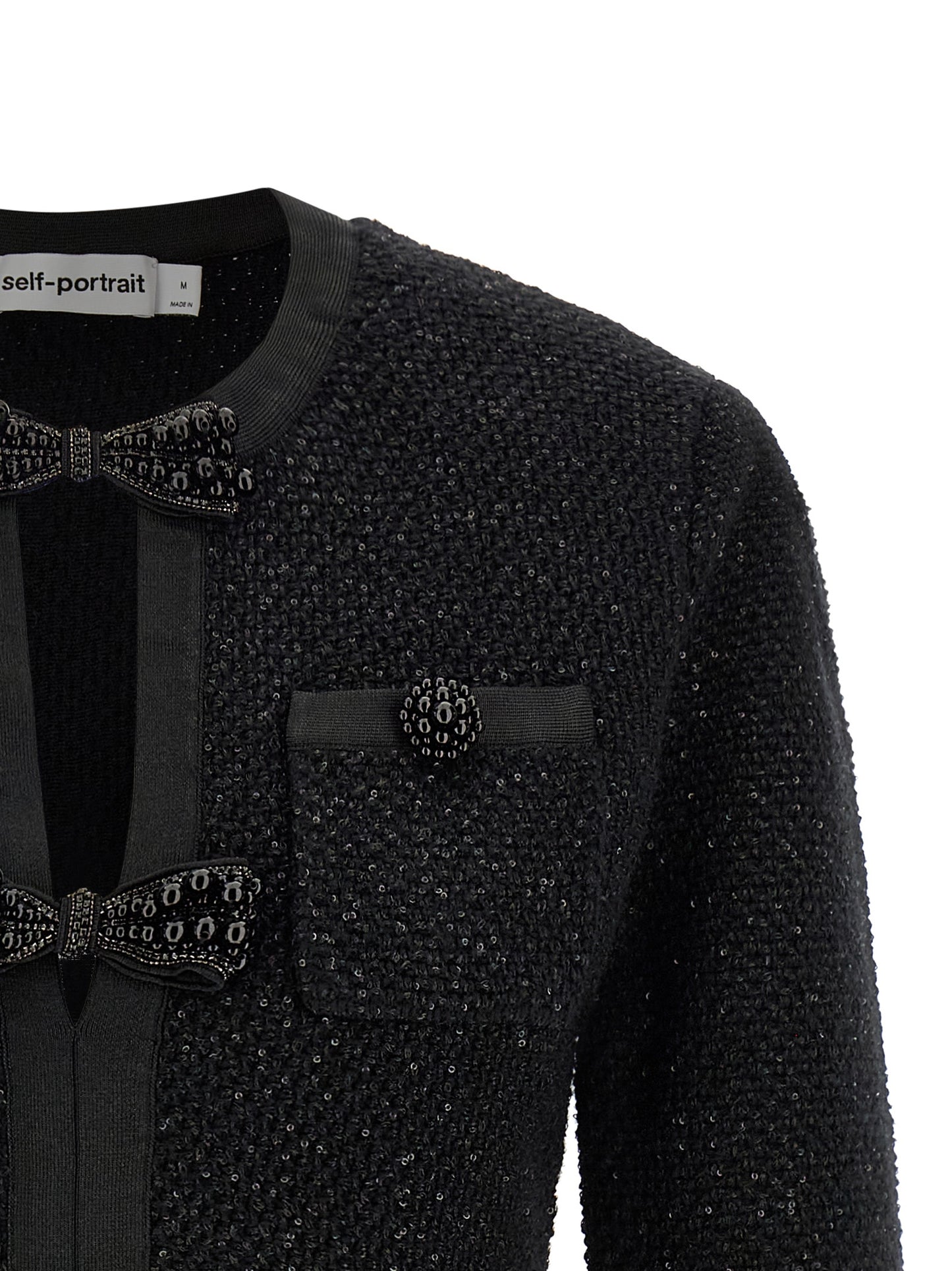 Dress by Self-Portrait for women in cotton polyester wool & sequins black features an magnificent silhouette, artfully detailed with a magnificent crew neckline and that flows into an magnificent short mini.