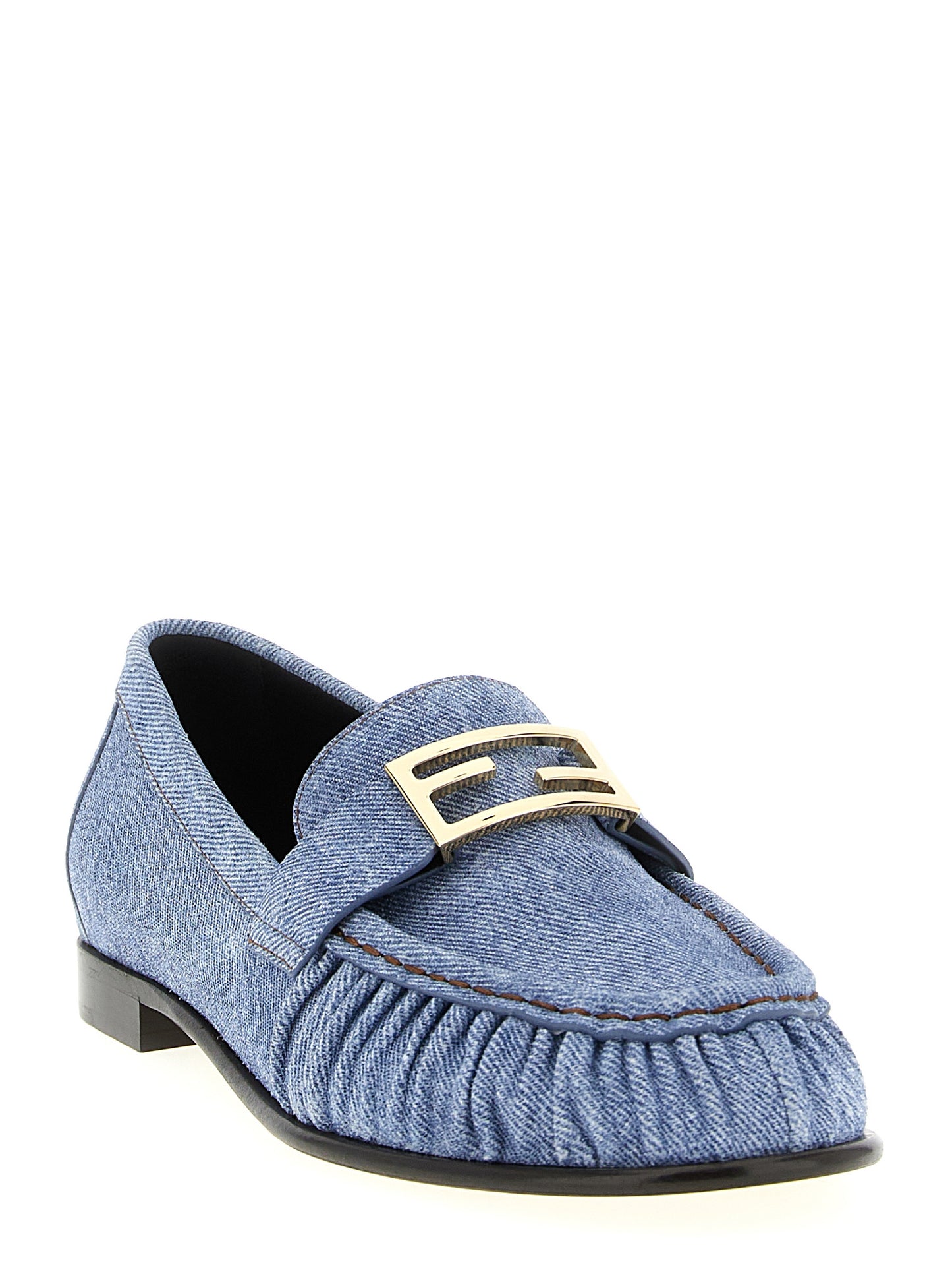 Flat Loafer Slip-On Shoes by Fendi for women in denim & calfskin leather light-blue showcases a timeless silhouette from the Women's Denim & Calfskin Leather Flat Loafer Slip-On Shoes collection, featuring a timeless flat and for a timeless finish.
