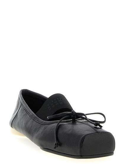 Ballet Flat Shoes by MM6 Maison Margiela for women in calfskin leather black, white & signature presents a effortless chic silhouette, showcasing the Women's Calfskin Leather Ballet Flat Shoes design with a effortless chic and square toe style for a sophisticated look.