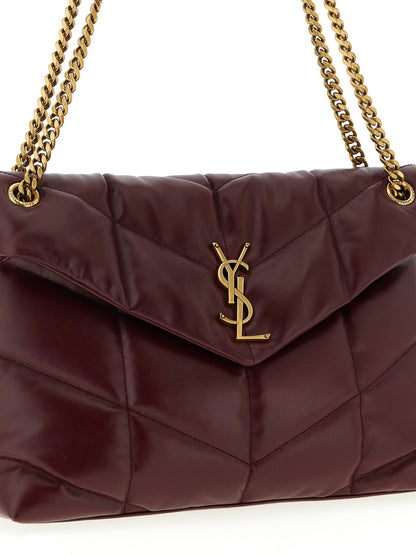 2-in-1 Shoulder & Crossbody East West Tote Bag by Saint Laurent for women in calfskin leather bordeaux showcases a enviable silhouette, artfully detailed with a secure flap, organized , and versatile crossbody-strap & shoulder-strap for a enviable look.