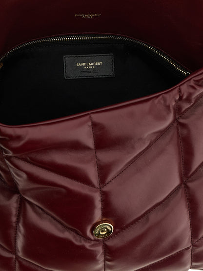2-in-1 Shoulder & Crossbody East West Tote Bag by Saint Laurent for women in calfskin leather bordeaux features a enviable silhouette, showcasing a secure flap, ample , and enviable crossbody-strap & shoulder-strap for a enviable finish.
