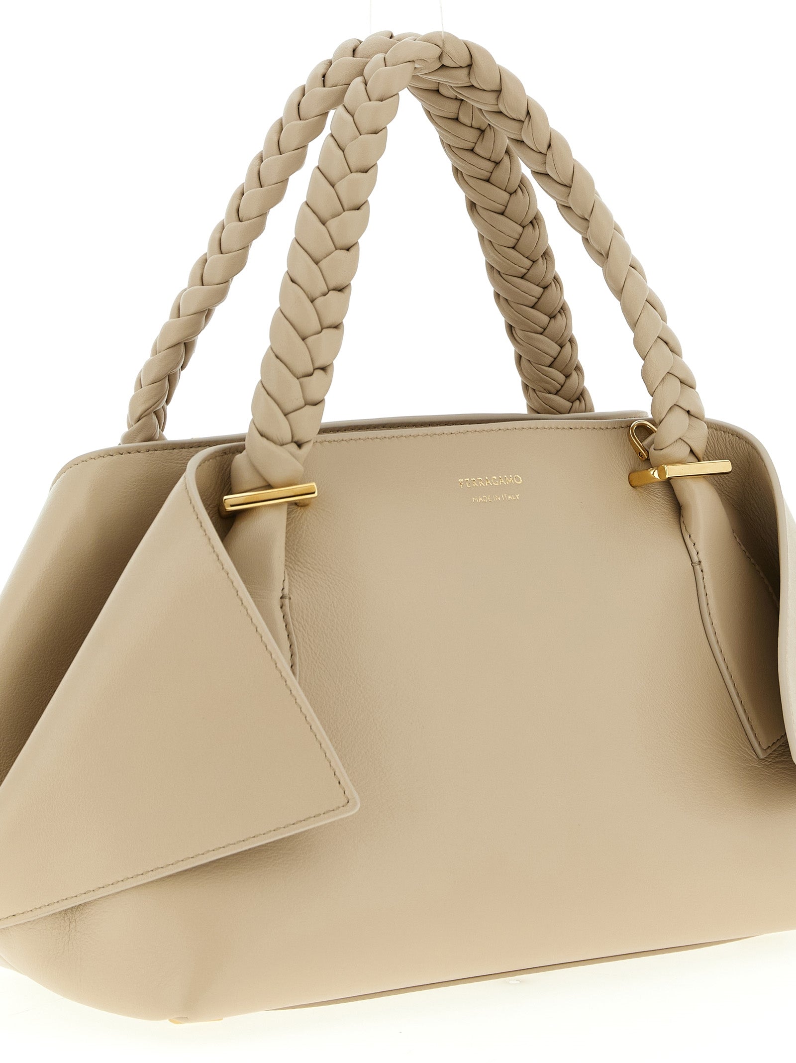 Handbag by Ferragamo for women in calfskin leather gray features a signature silhouette, showcasing a secure zipper and signature with versatile shoulder-strap, adjustable-strap & handle for a sophisticated look.