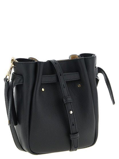 Crossbody Bucket Handbag by Tory Burch for women in suede leather black features a multifaceted silhouette, showcasing a secure magnetic and multifaceted with versatile crossbody-strap, shoulder-strap, adjustable-strap, belt-strap & handle for multifaceted style.