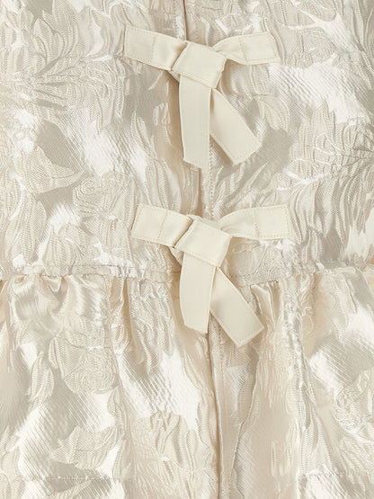 Blouse by Ganni for women in polyamide polyester satin white & jacquard features an architectural silhouette with a refined and elegant for a architectural look.
