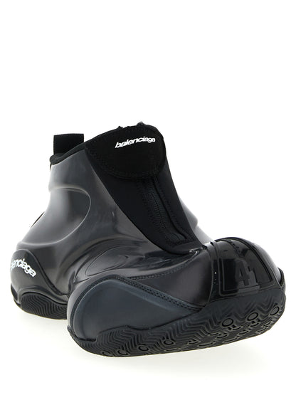 Athletic Sneakers by Balenciaga for men in stretch nylon polyester & polyurethane black & signature presents a sleek silhouette, perfectly capturing the basketball style essence of Icon Men's Basketball Stretch Nylon Polyester & Polyurethane Athletic Sneakers with its sleek design and premium finish.