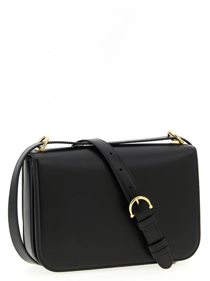 2-in-1 Shoulder & Crossbody Flap Bag by Gucci for women in calfskin leather black features a stately silhouette, showcasing a secure flap, ample , and stately crossbody-strap, shoulder-strap & adjustable-strap for a stately finish.