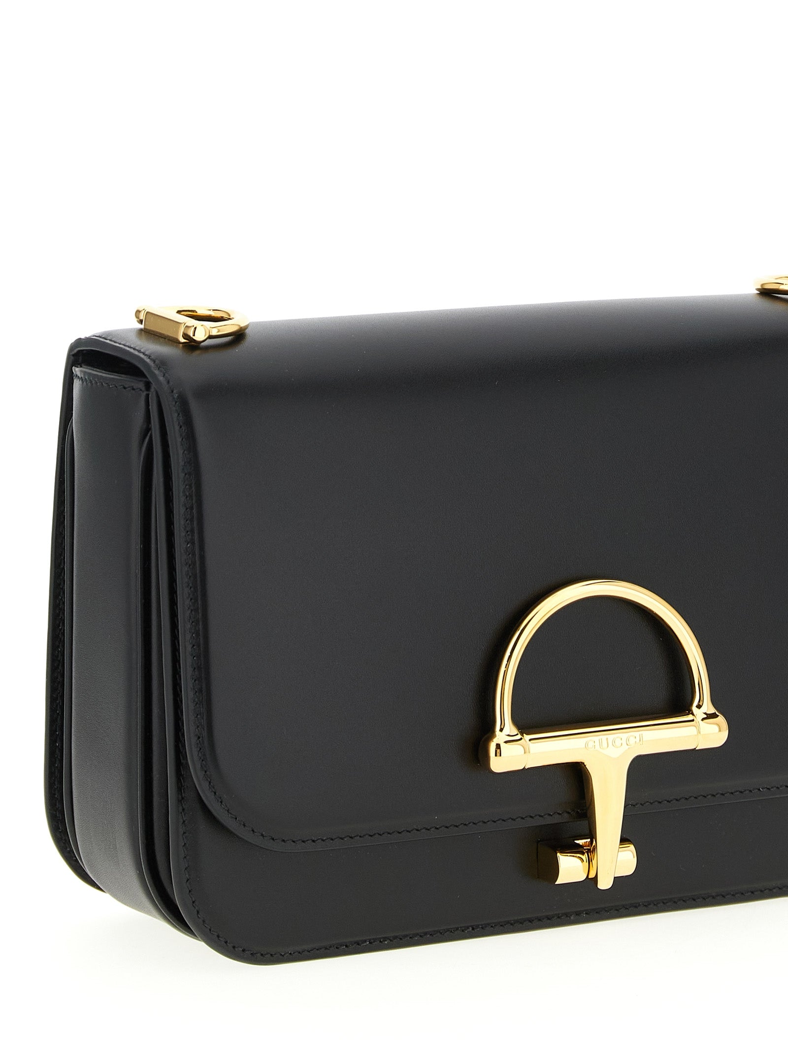 2-in-1 Shoulder & Crossbody Flap Bag by Gucci for women in calfskin leather black showcases a statuesque silhouette, artfully detailed with a secure flap, organized , and versatile crossbody-strap, shoulder-strap & adjustable-strap for a statuesque look.
