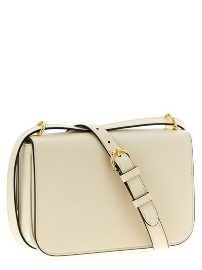 2-in-1 Shoulder & Crossbody Flap Bag by Gucci for women in calfskin leather white features a effortless chic silhouette with a secure flap, ample , and versatile crossbody-strap, shoulder-strap & adjustable-strap for a effortless chic finish.