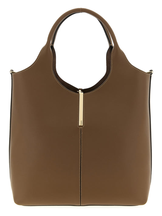 Small Handbag by Tod's for women in bos taurus calf suede leather brown features a exquisite silhouette, showcasing a secure snap & hook and exquisite with versatile shoulder-strap, adjustable-strap & handle for a exquisite finish.